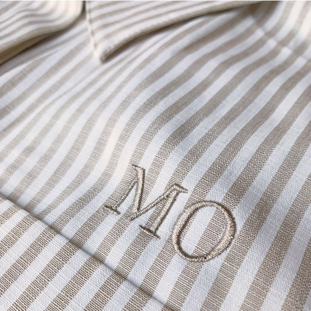 Embroidered initials on shirt