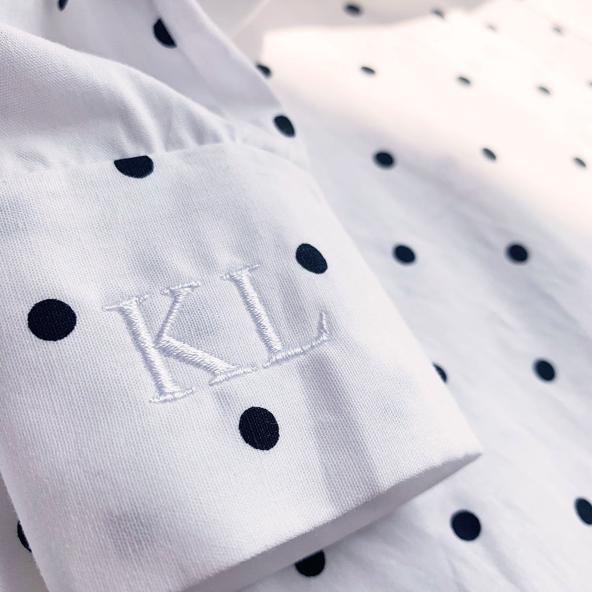 Embroidered initials on shirt