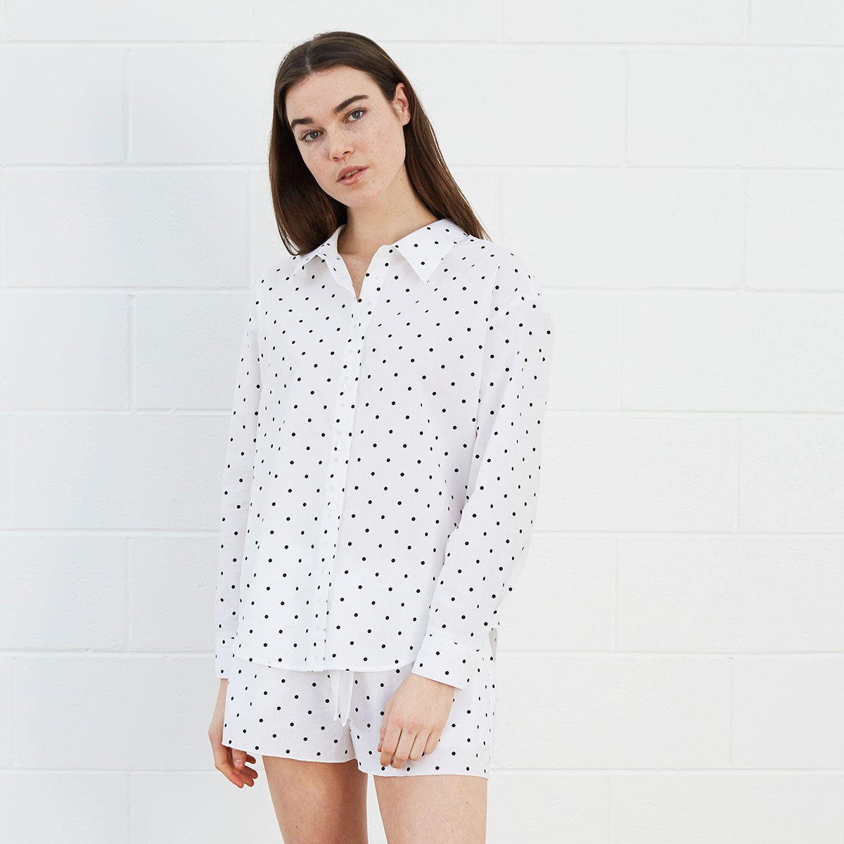 Woman wearing polka dot shirt