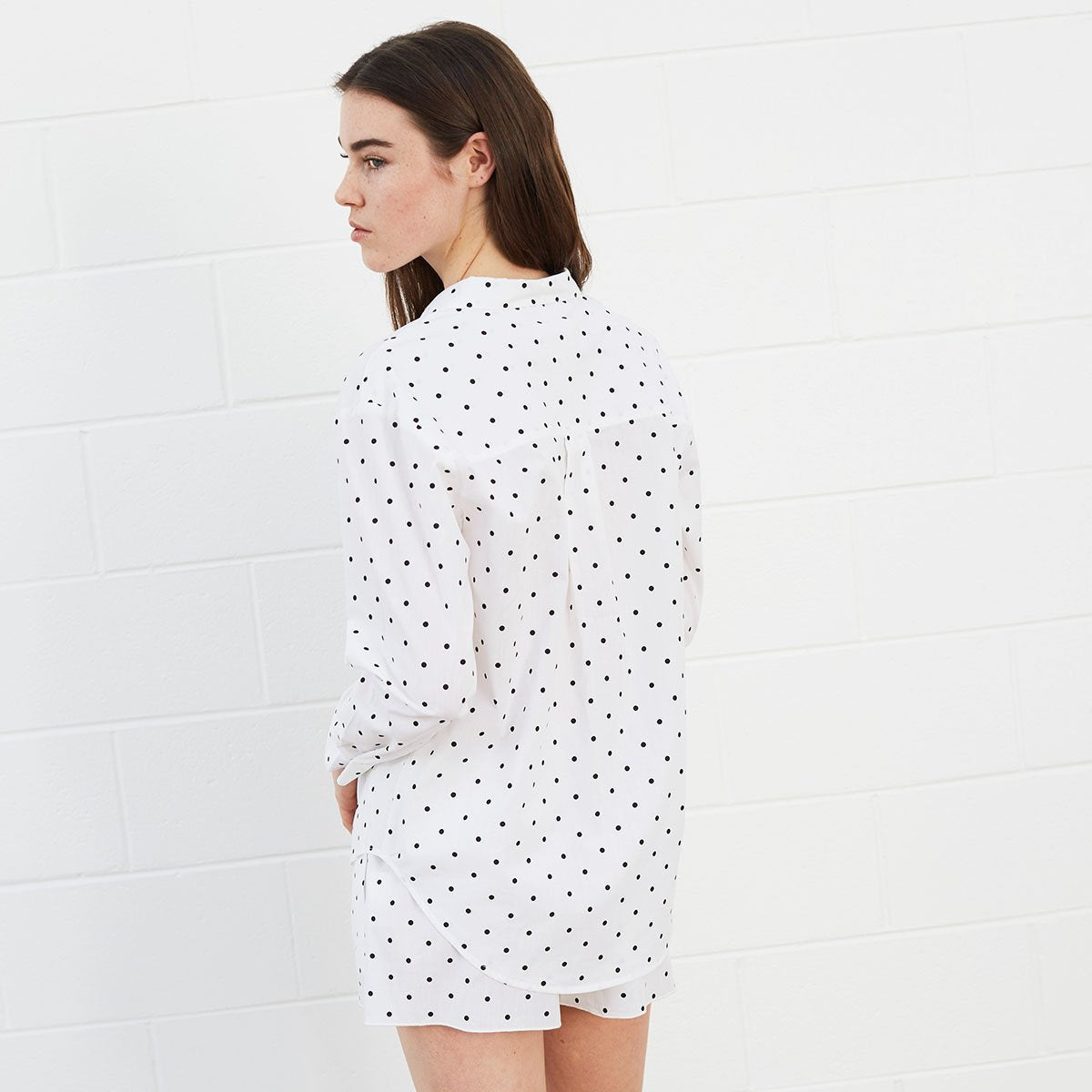 Woman wearing polka dot shirt