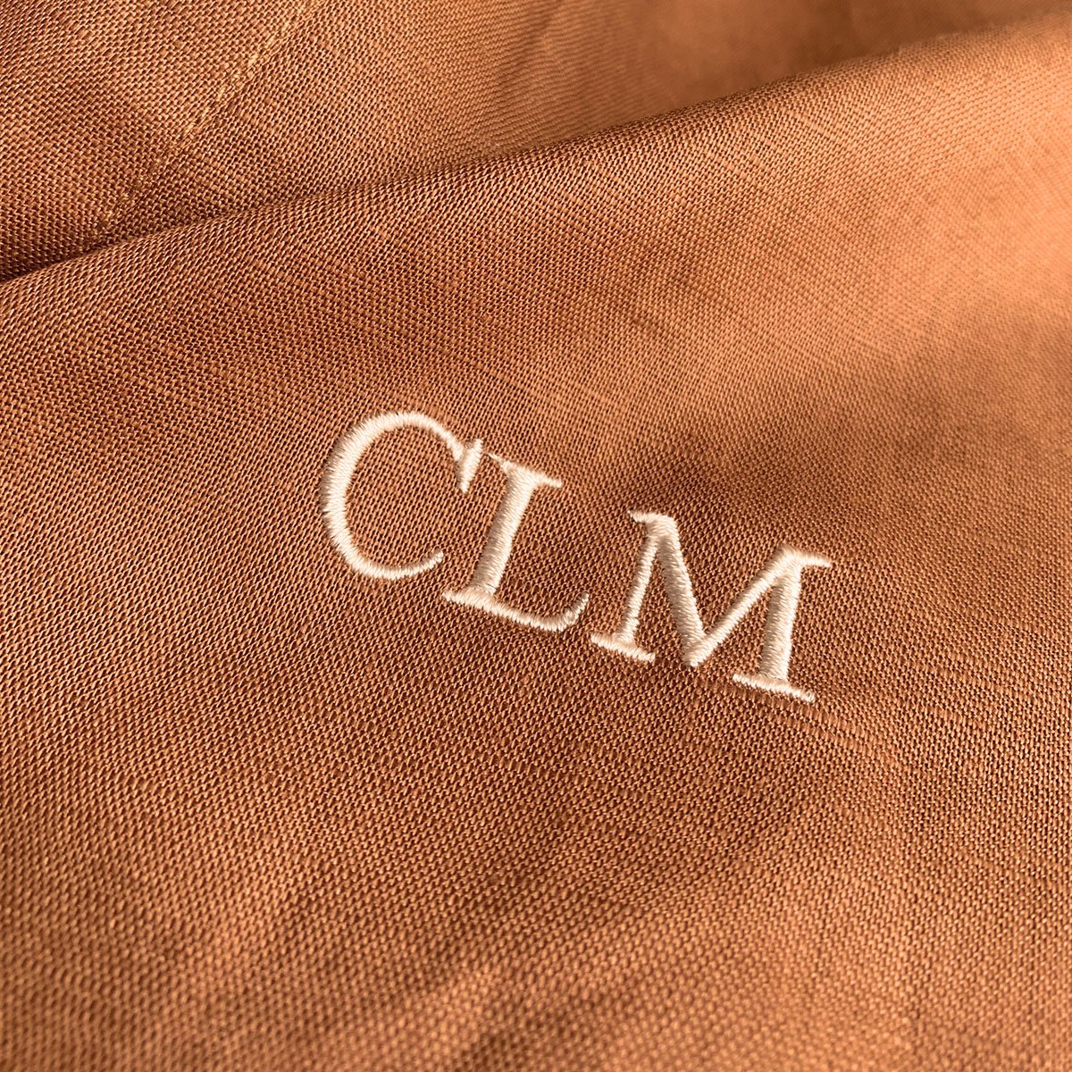 Embroidered initials on shirt
