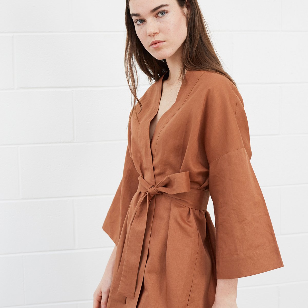 Woman wearing brown robe