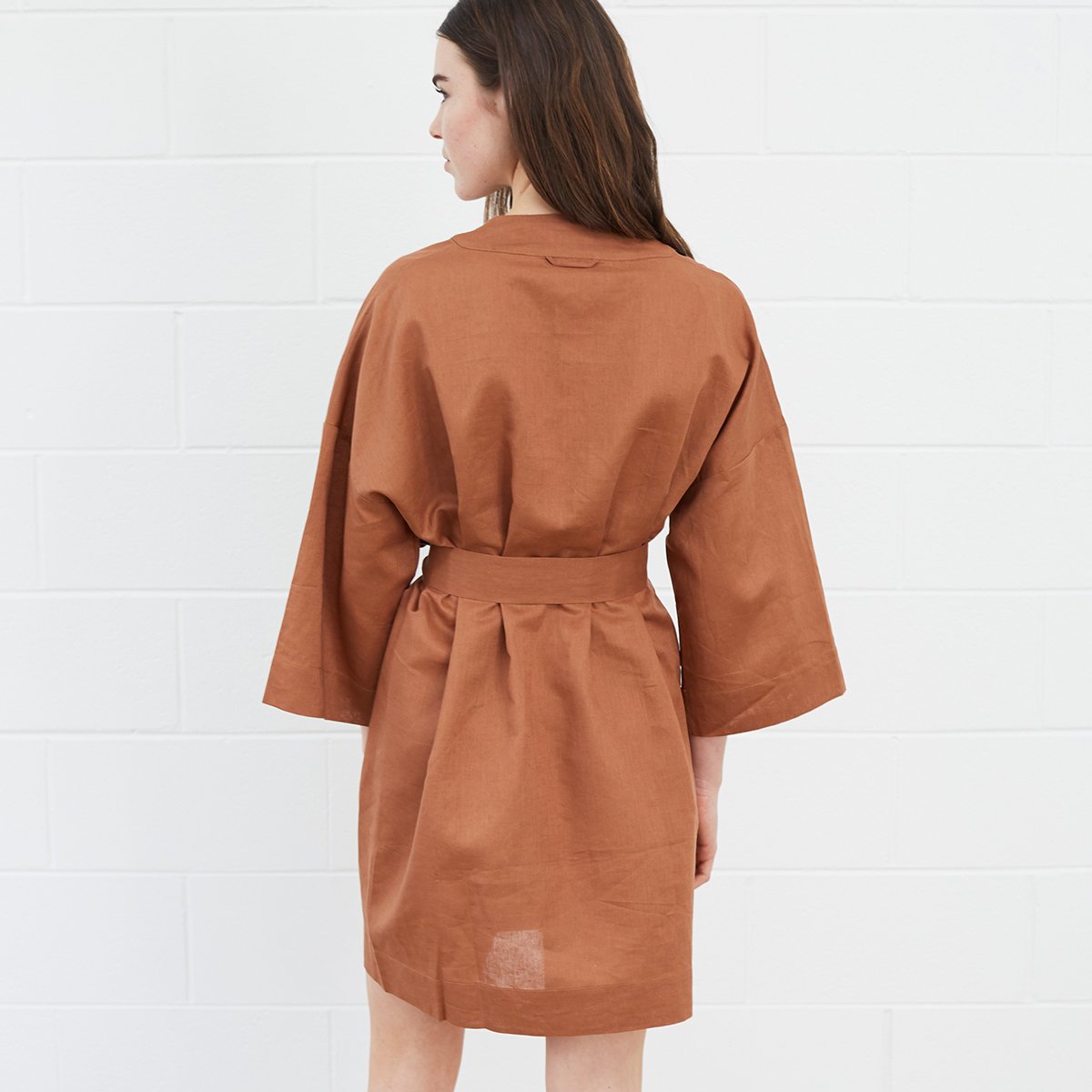 Woman wearing brown robe