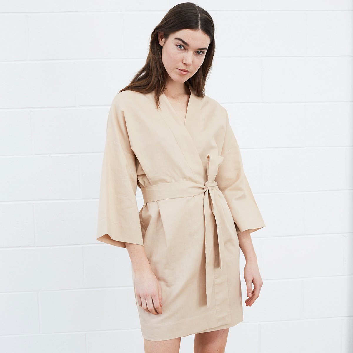 Woman wearing beige robe