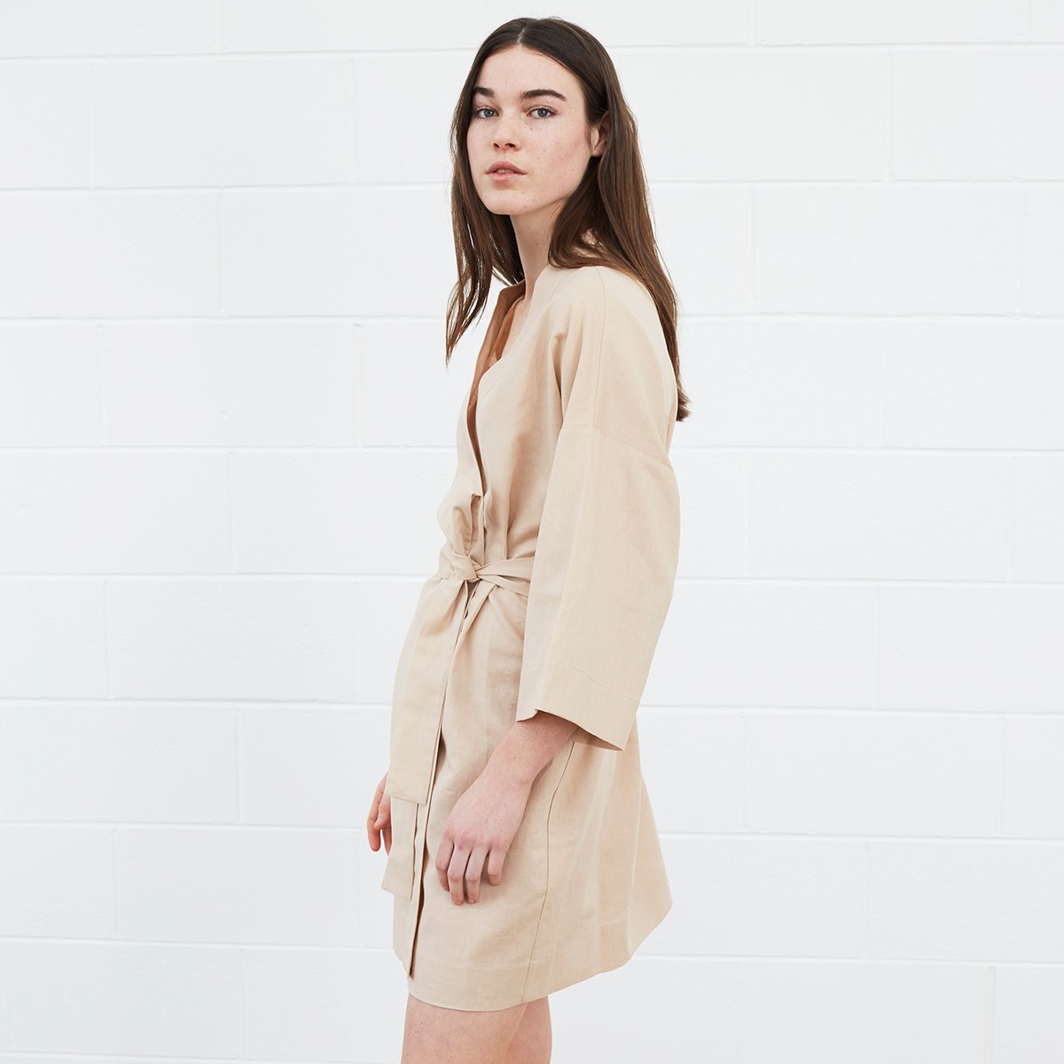 Woman wearing beige robe