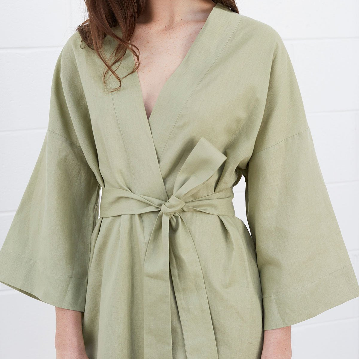 Woman wearing green robe