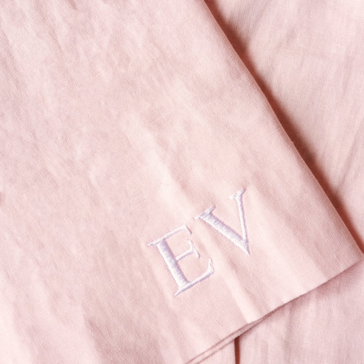 Embroidered initials on shirt