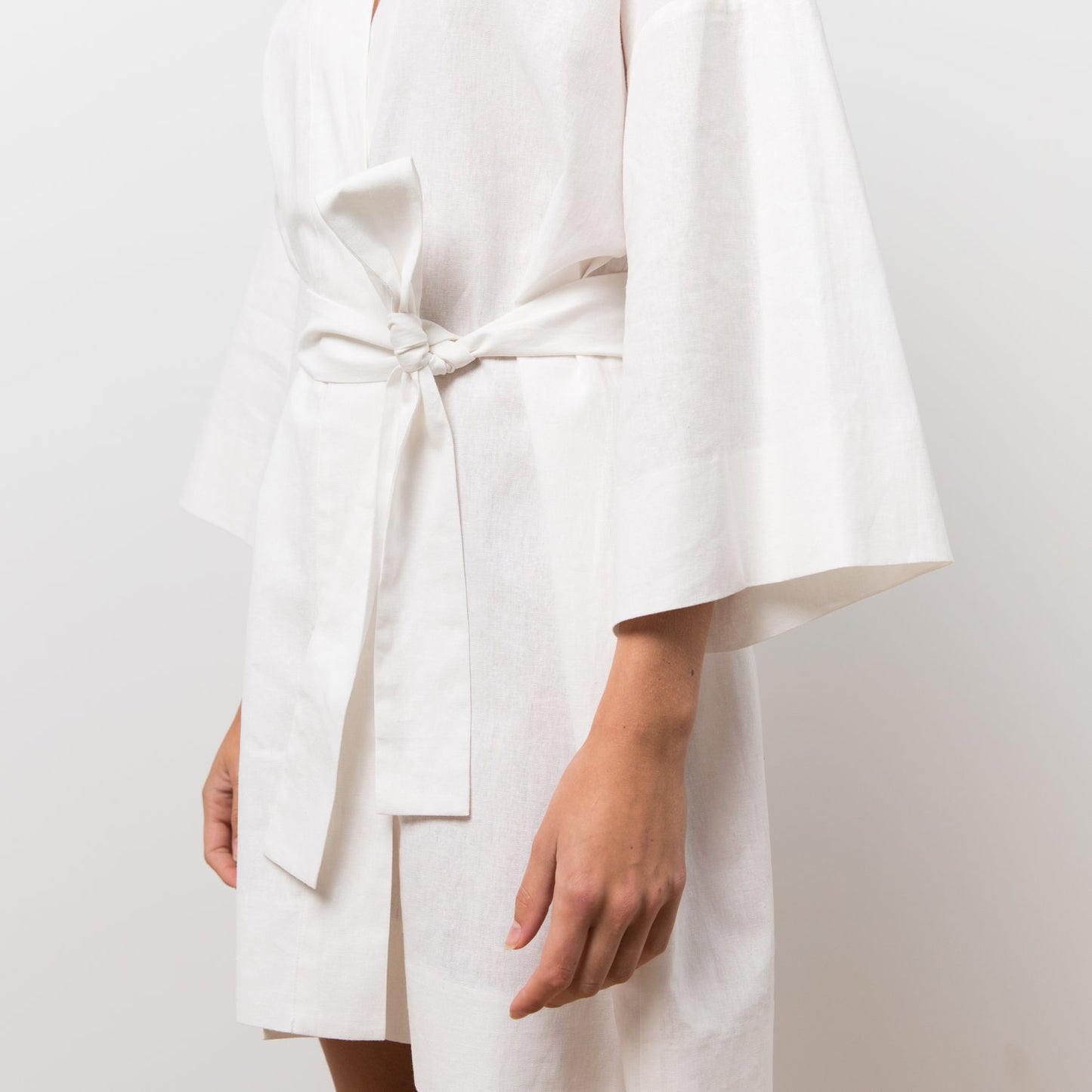 Woman wearing white robe