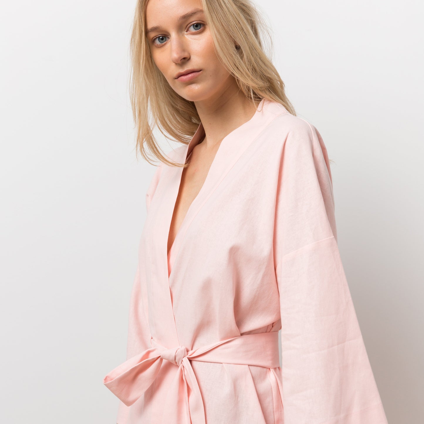 Woman wearing pink robe